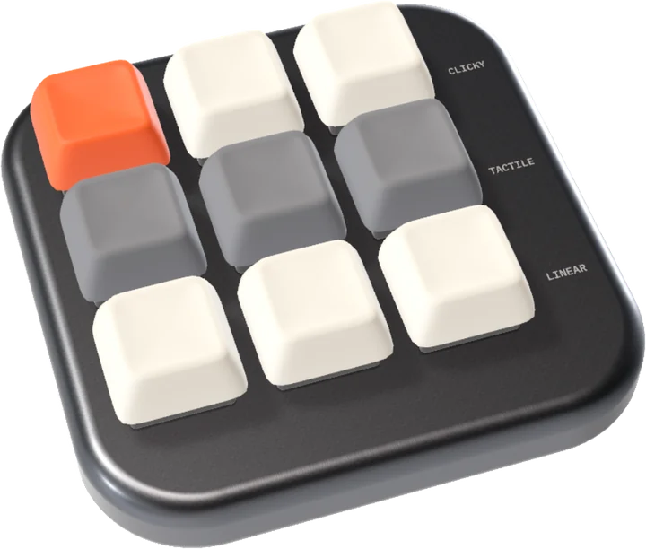 Keys: nine keycaps in three rows on a graphite switch tester