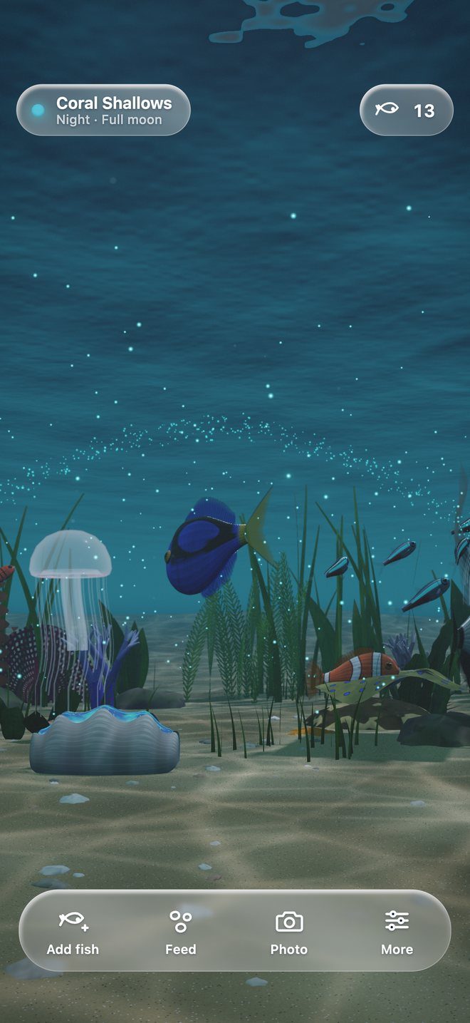 The reef at night under a full moon, with glowing plankton and moon jellyfish
